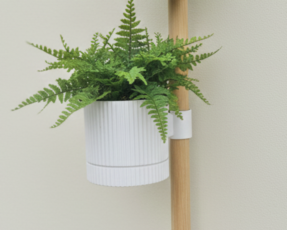 Vertical modular pole desk organiser with shelves and planter