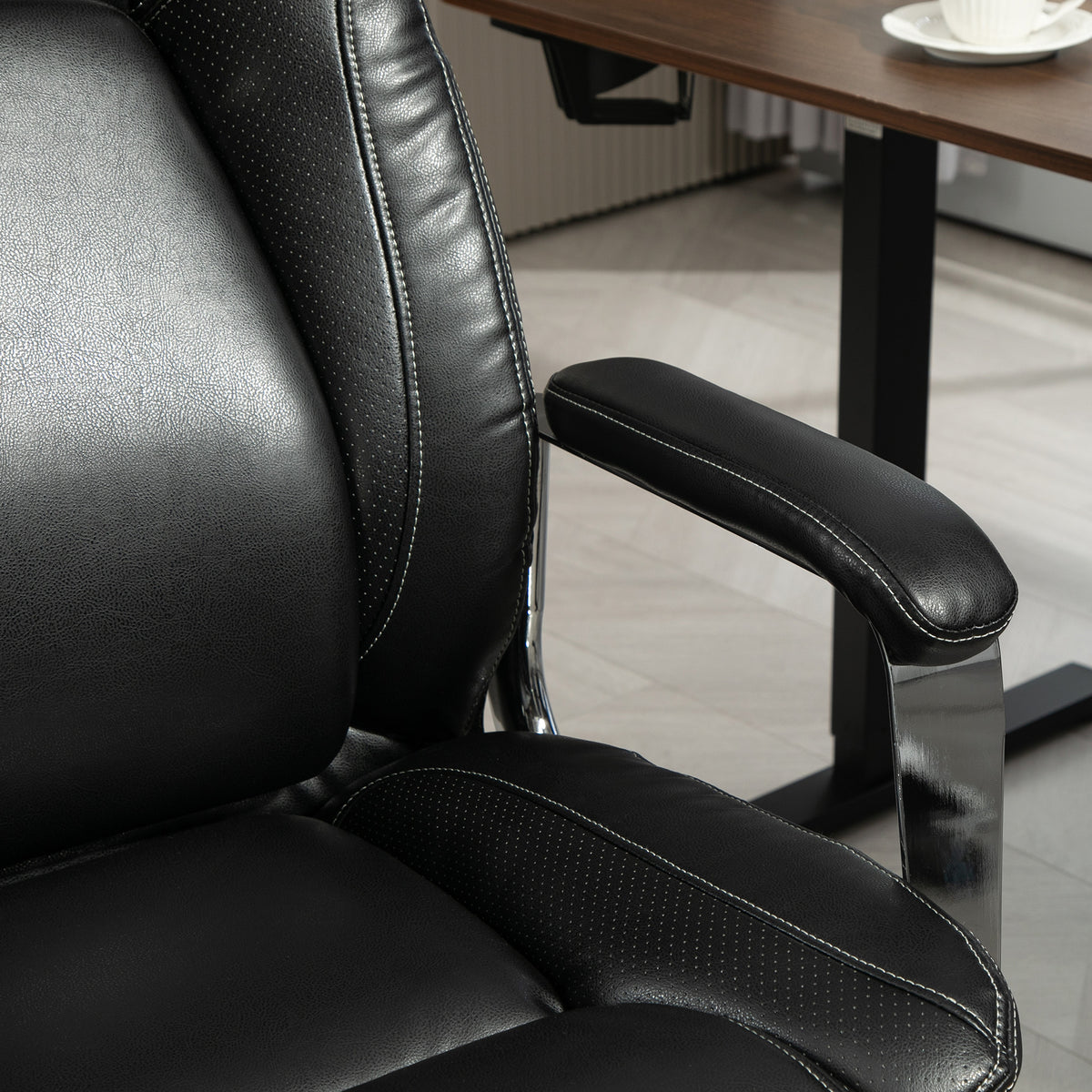 Heavy duty black faux leather office chair with headrest