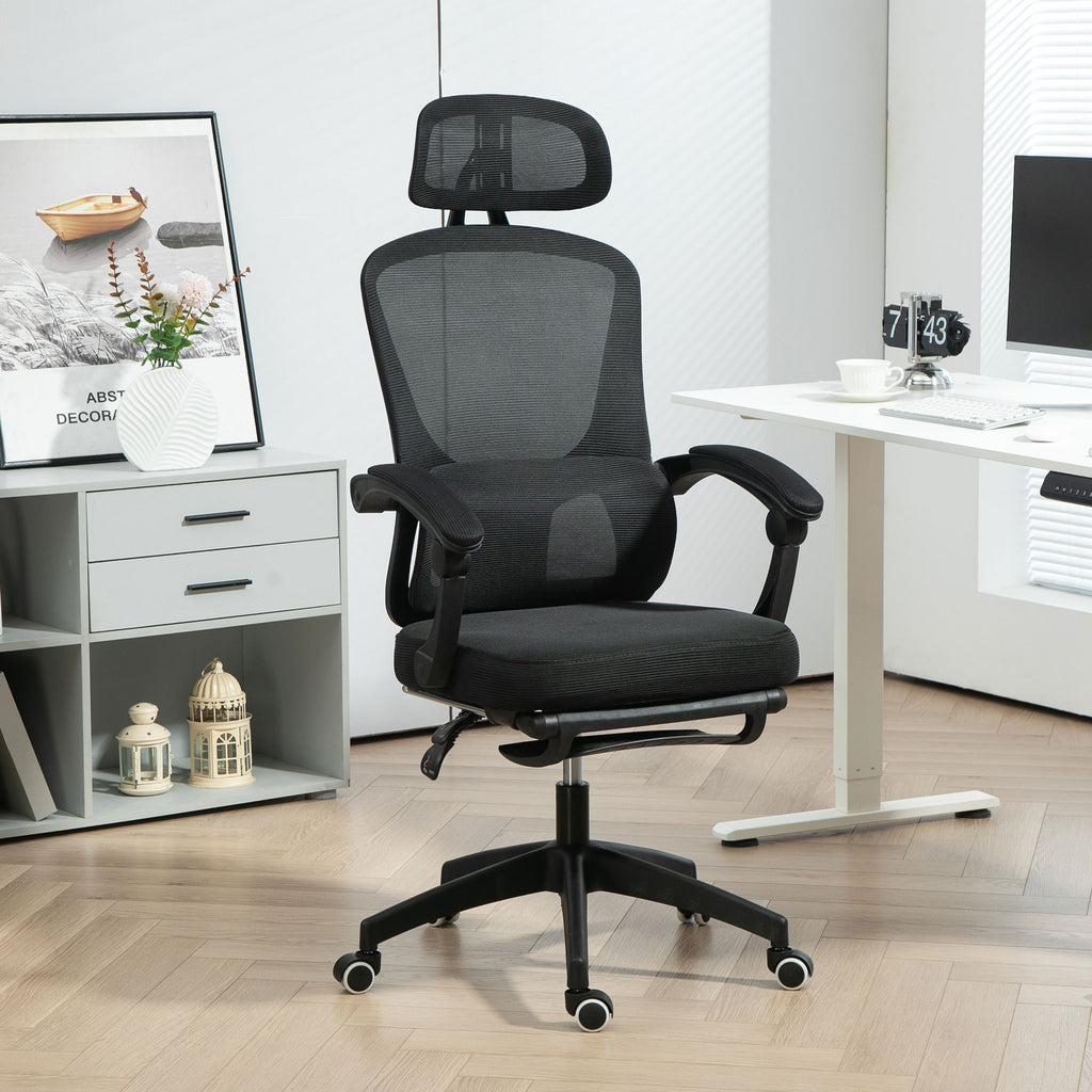 Black reclining mesh office chair with lumbar support and footrest