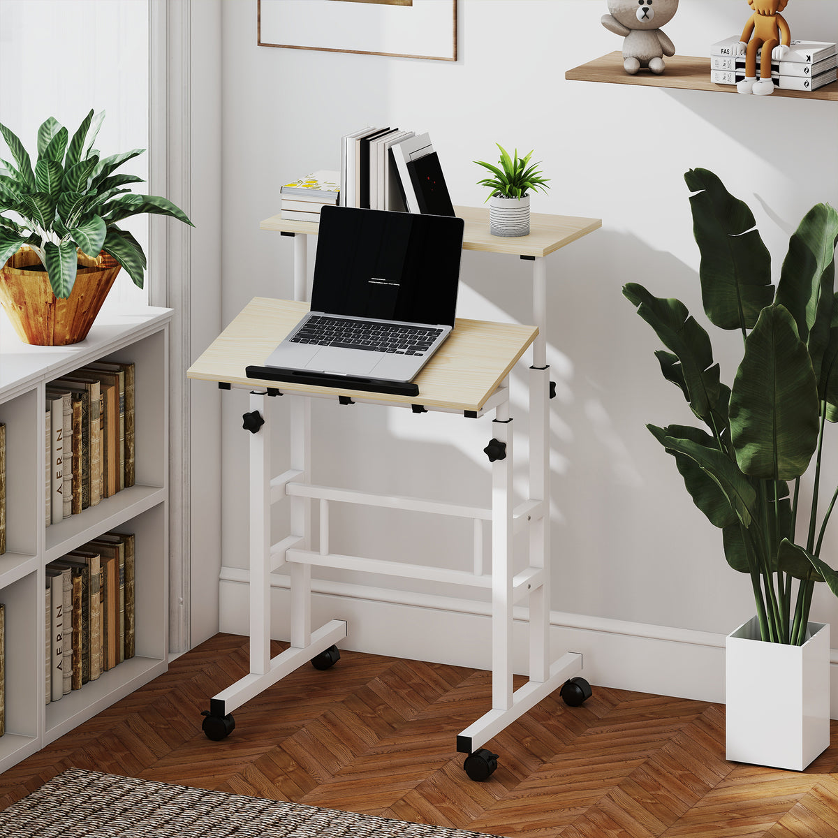 Mobile sit-stand laptop desk on wheels with tilting top
