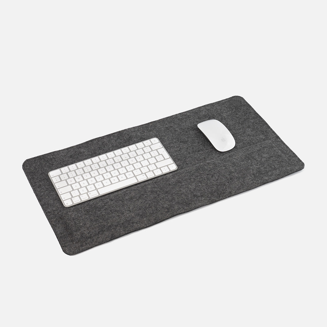 Large grey felt desk mat with padded wrist support