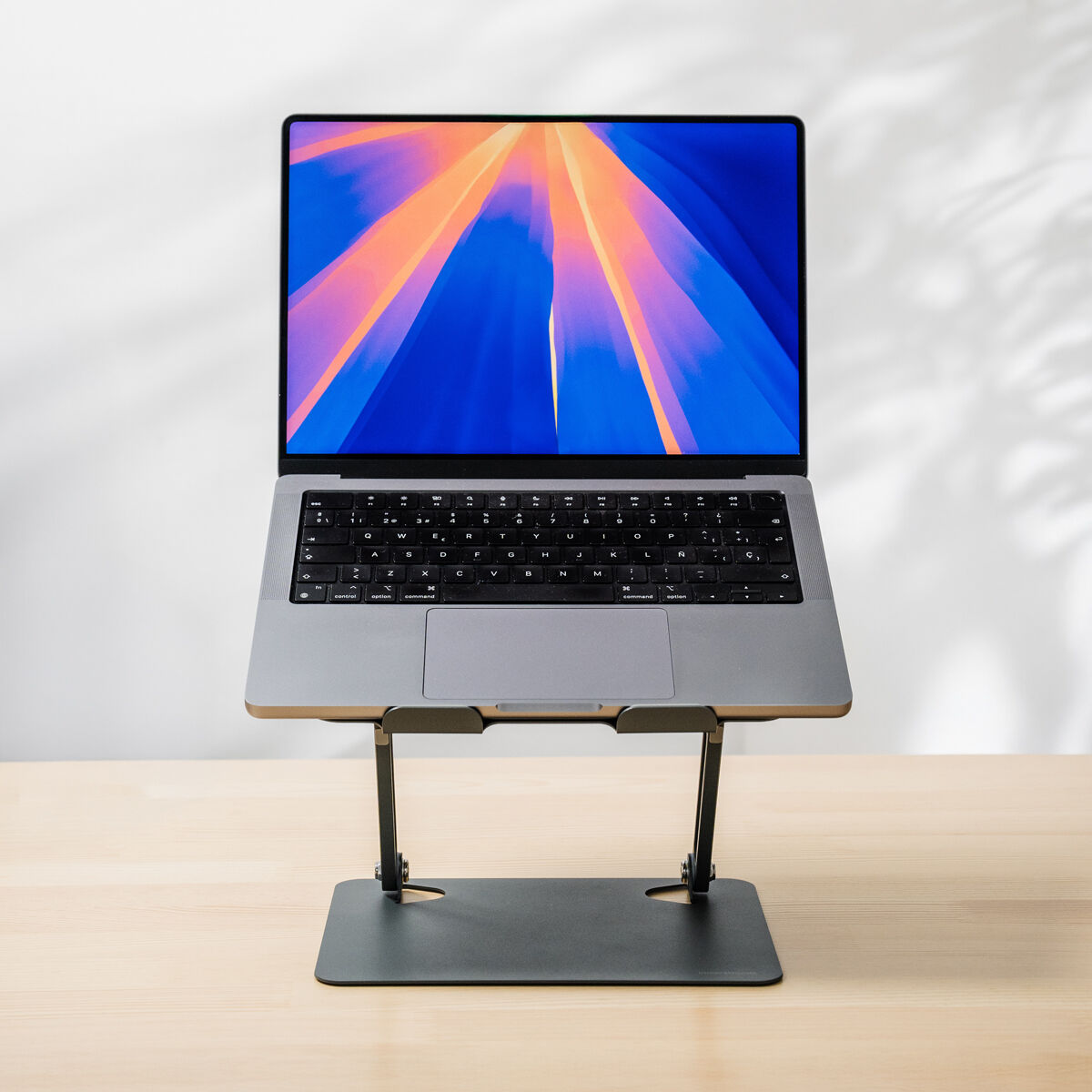 Carbon steel folding laptop stand with anti-slip pads