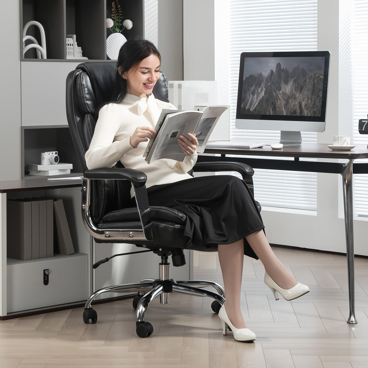 Heavy duty black faux leather office chair with headrest